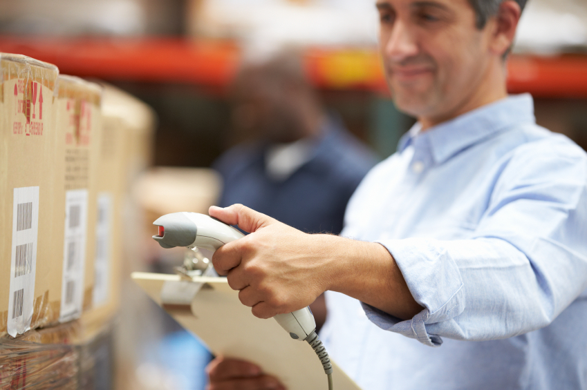 Worker Scanning Bar Code